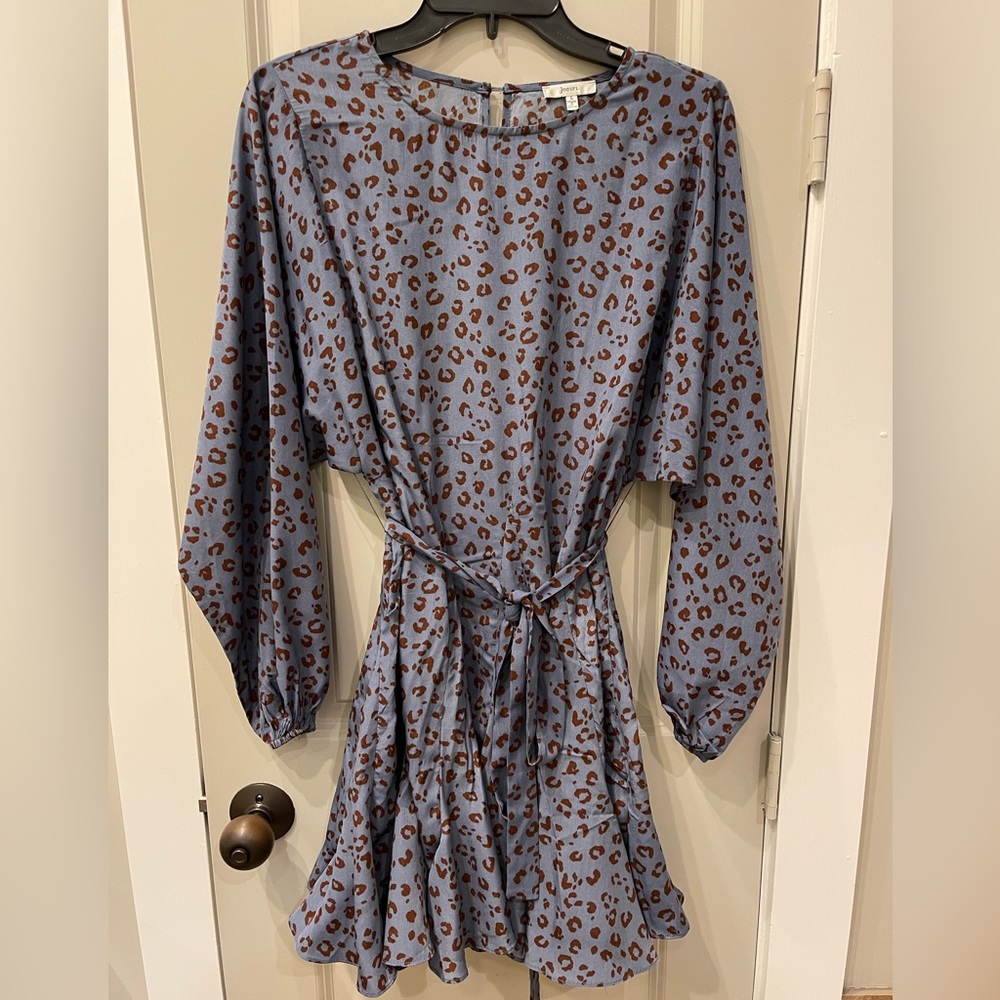 This is an adorable dress that I purchased at a high end boutique.